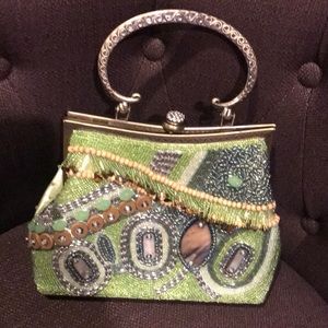 Gorgeous beaded lime green and silver clutch.